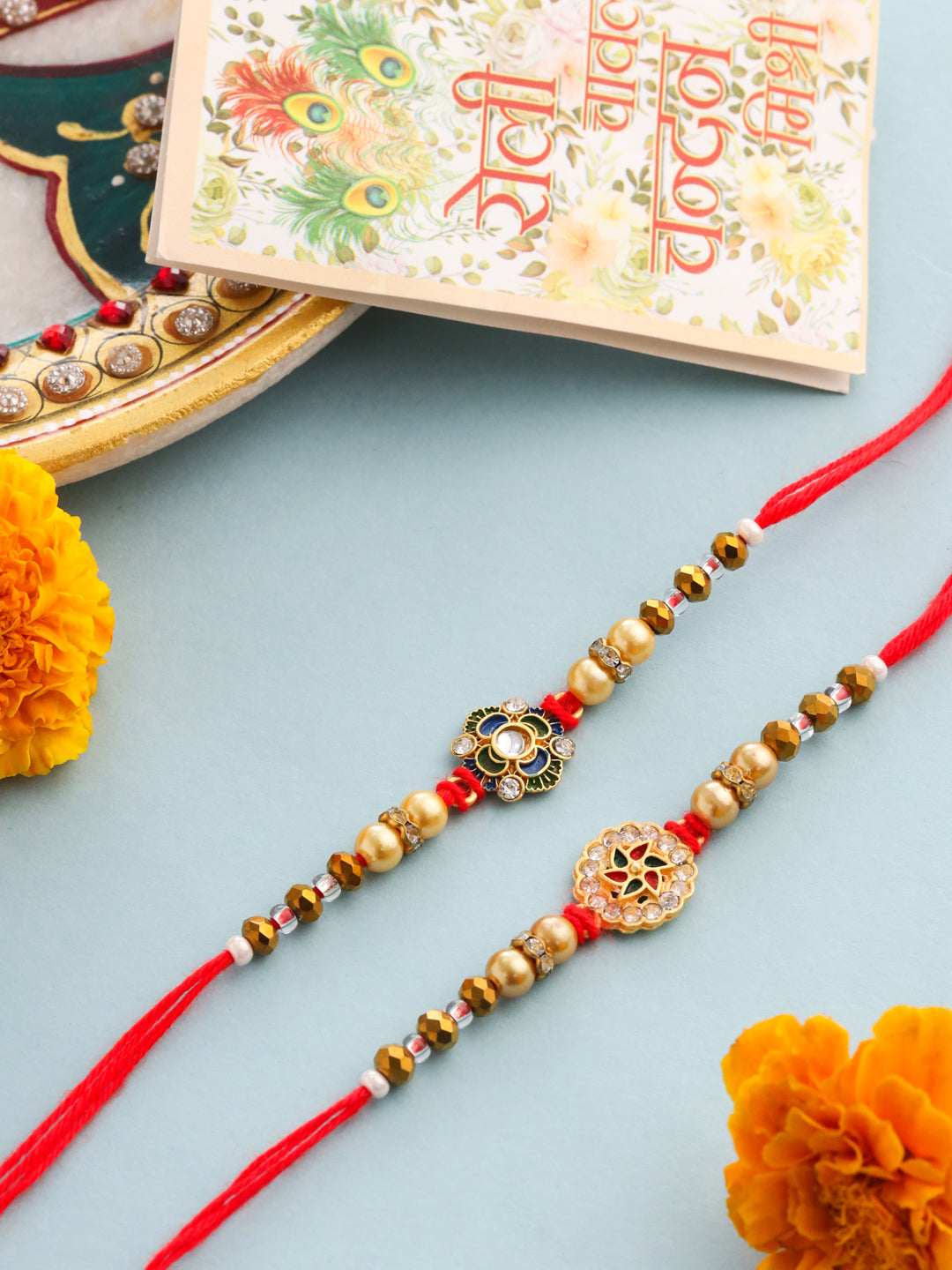 NVR Men Set of 2 Red & Gold Floral Design Artificial Stones & Beads Thread Rakhi With Roli Chawal Chandan & Mishri - Distacart