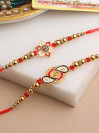NVR Men Set of 2 Red & Gold Floral Design Artificial Beads Thread Rakhi With Roli Chawal Chandan & Mishri - Distacart