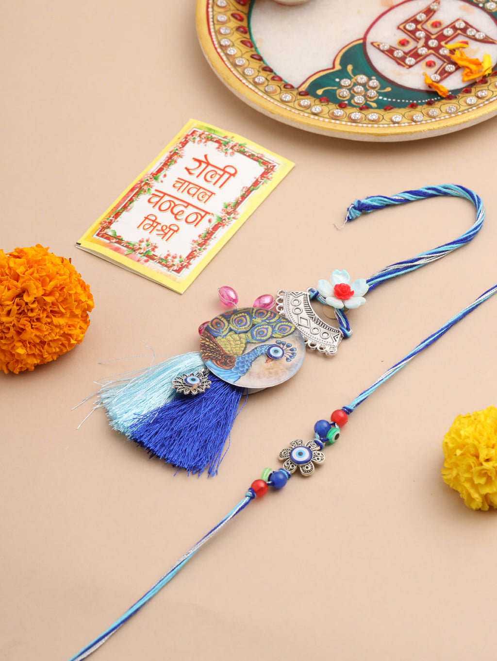 NVR Set of 2 Blue Evil Eye & Peacock Design Artificial Beads Bhaiya Bhabhi Rakhi With Roli Chawal Chandan & Mishri - Distacart