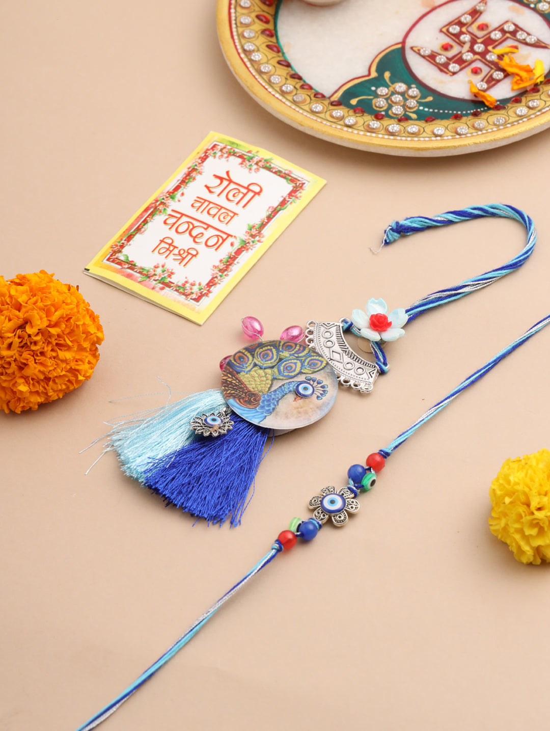 NVR Set of 2 Blue Evil Eye & Peacock Design Artificial Beads Bhaiya Bhabhi Rakhi With Roli Chawal Chandan & Mishri - Distacart