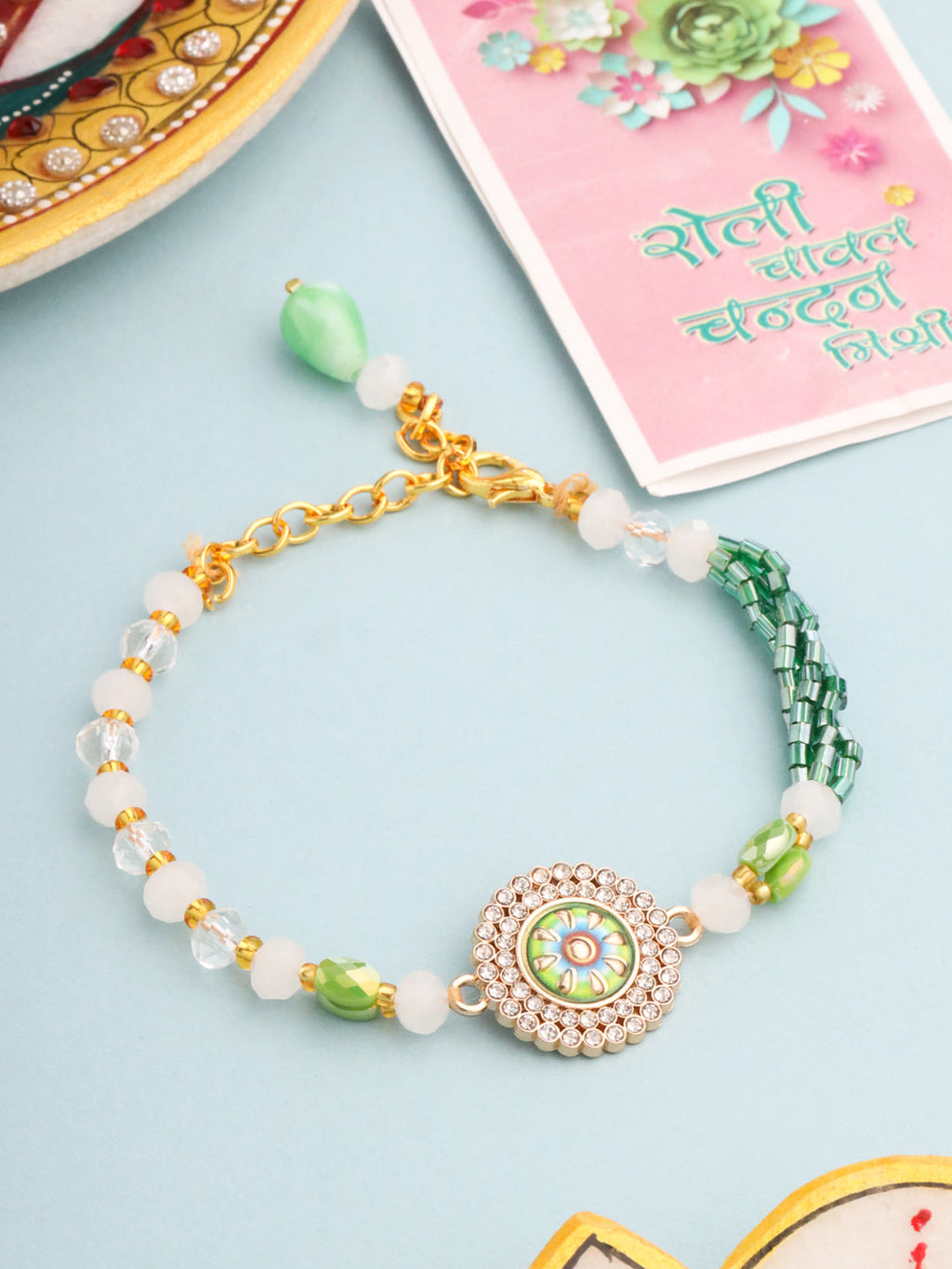 NVR Women Green Artificial Stones & Beads Floral Wraparound Rakhi with Roli Chawal Chandan & Mishri - Distacart