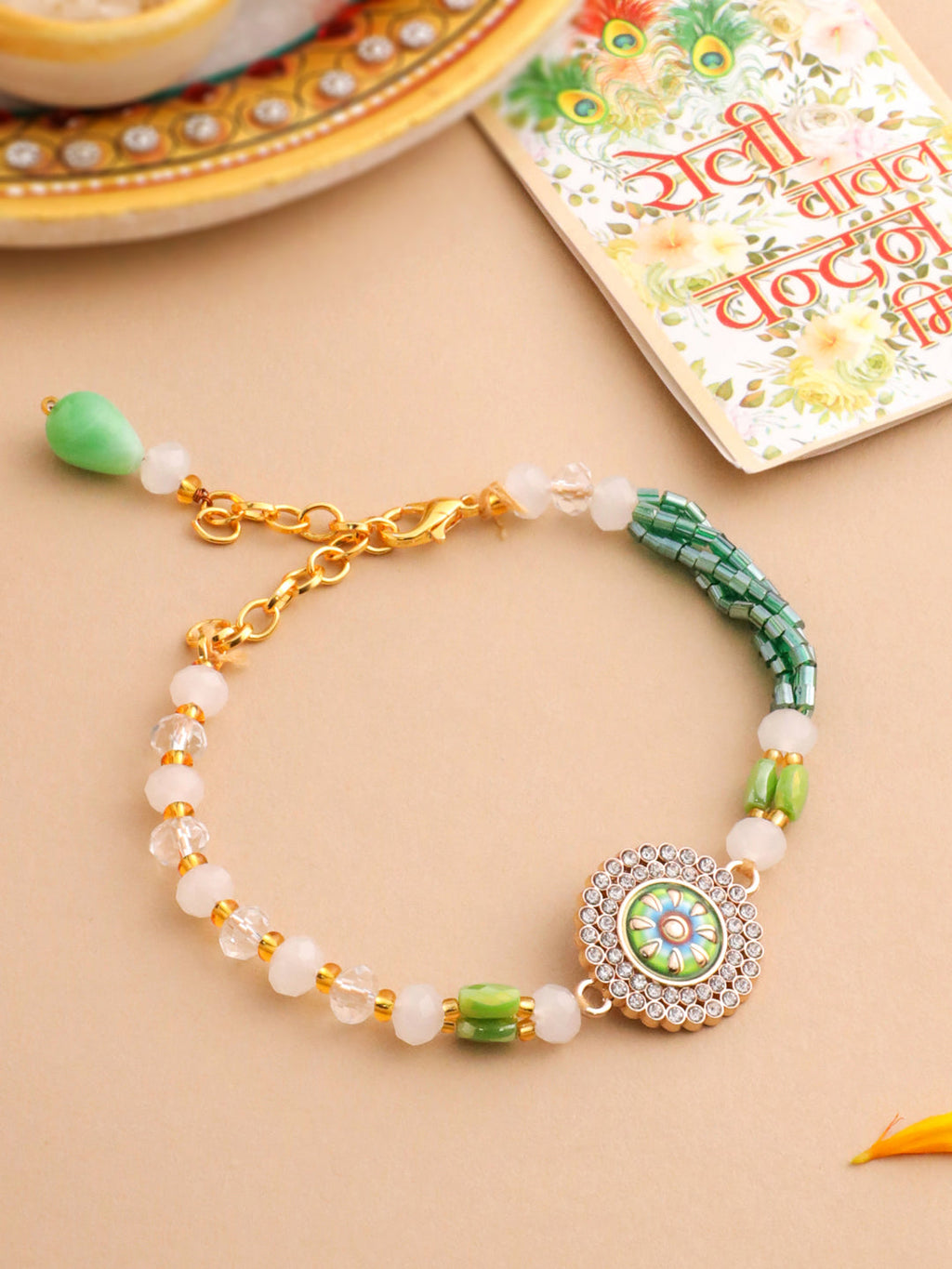 NVR Women Green Artificial Stones & Beads Floral Wraparound Rakhi with Roli Chawal Chandan & Mishri - Distacart