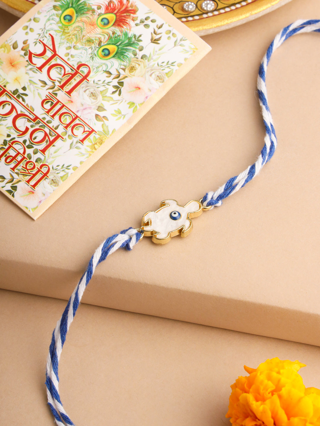NVR Men Blue Evil Eye Thread Rakhi with Roli Chawal Chandan & Mishri - Distacart