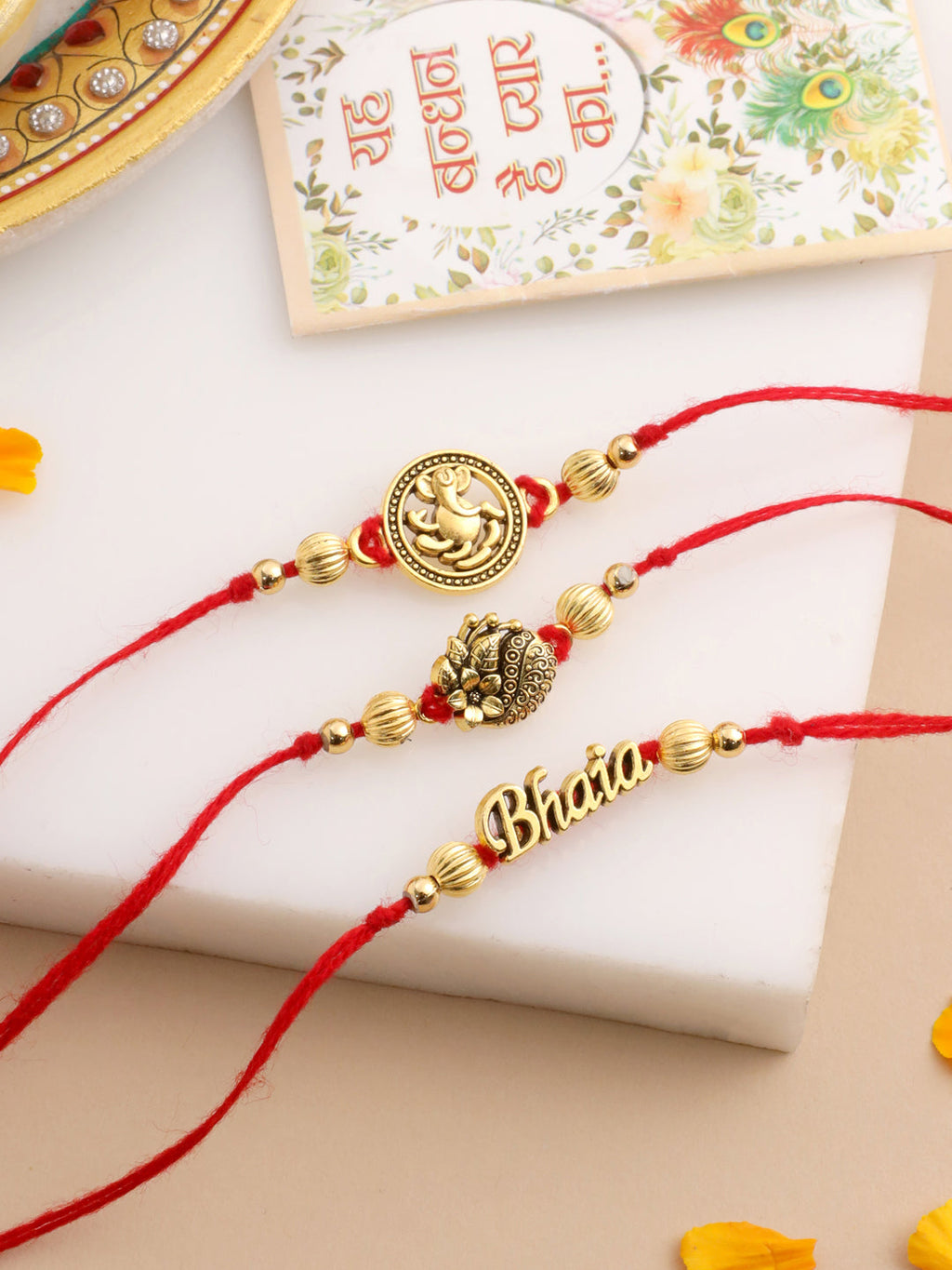 NVR Men Set of 3 Gold Toned Thread Rakhi with Roli Chawal Chandan & Mishri - Distacart