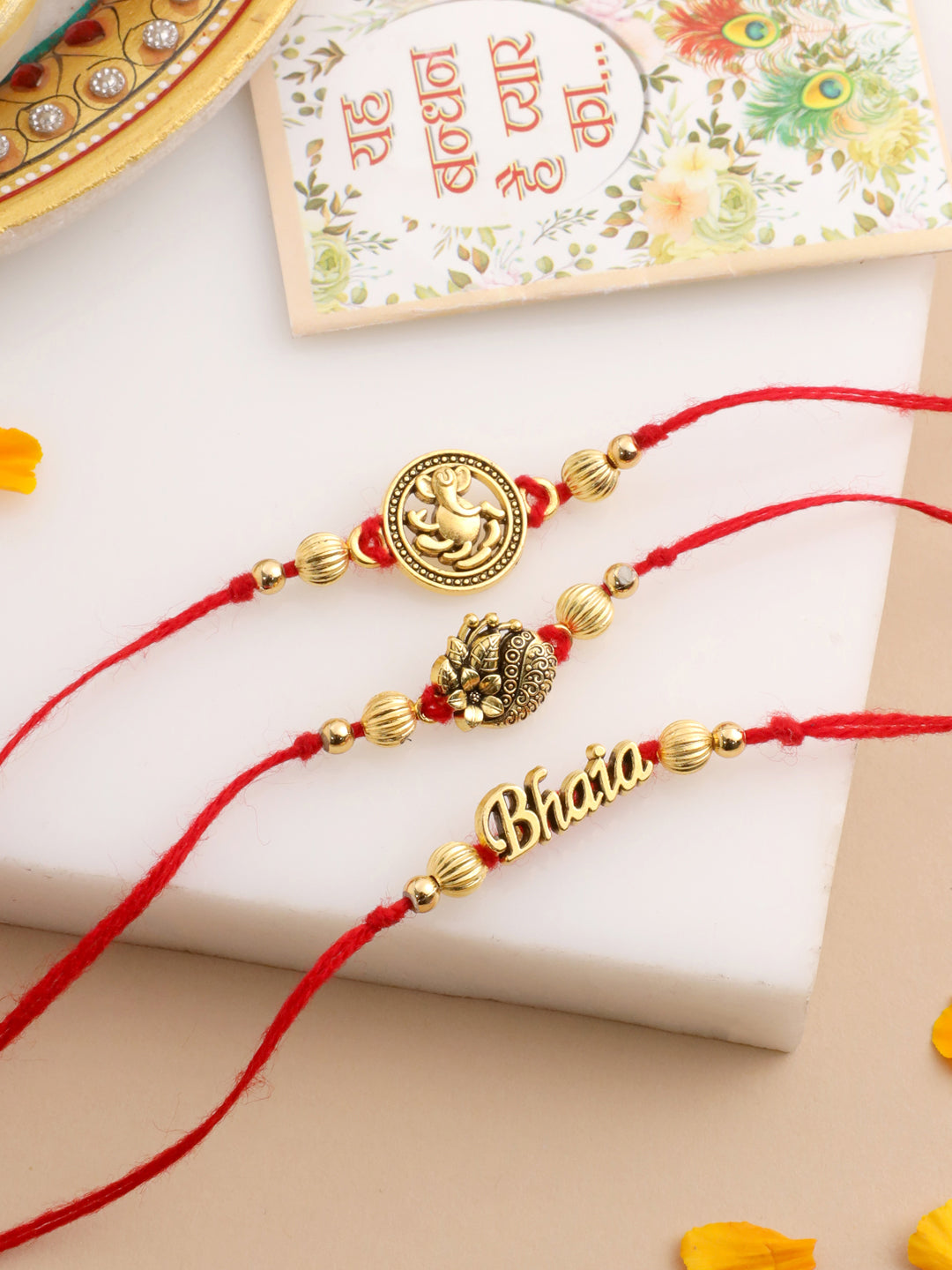 NVR Men Set of 3 Gold Toned Thread Rakhi with Roli Chawal Chandan & Mishri - Distacart