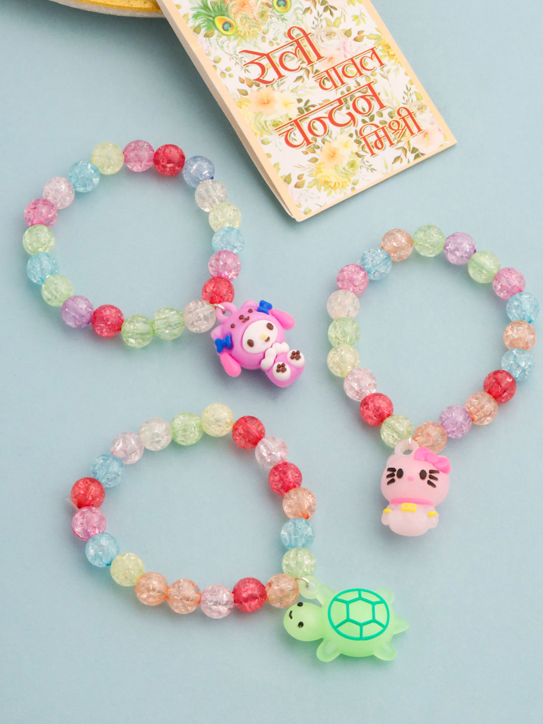 NVR Kids Set of 3 Cartoon Design Artificial Beads Thread Rakhi with Roli Chawal Chandan & Mishri - Distacart