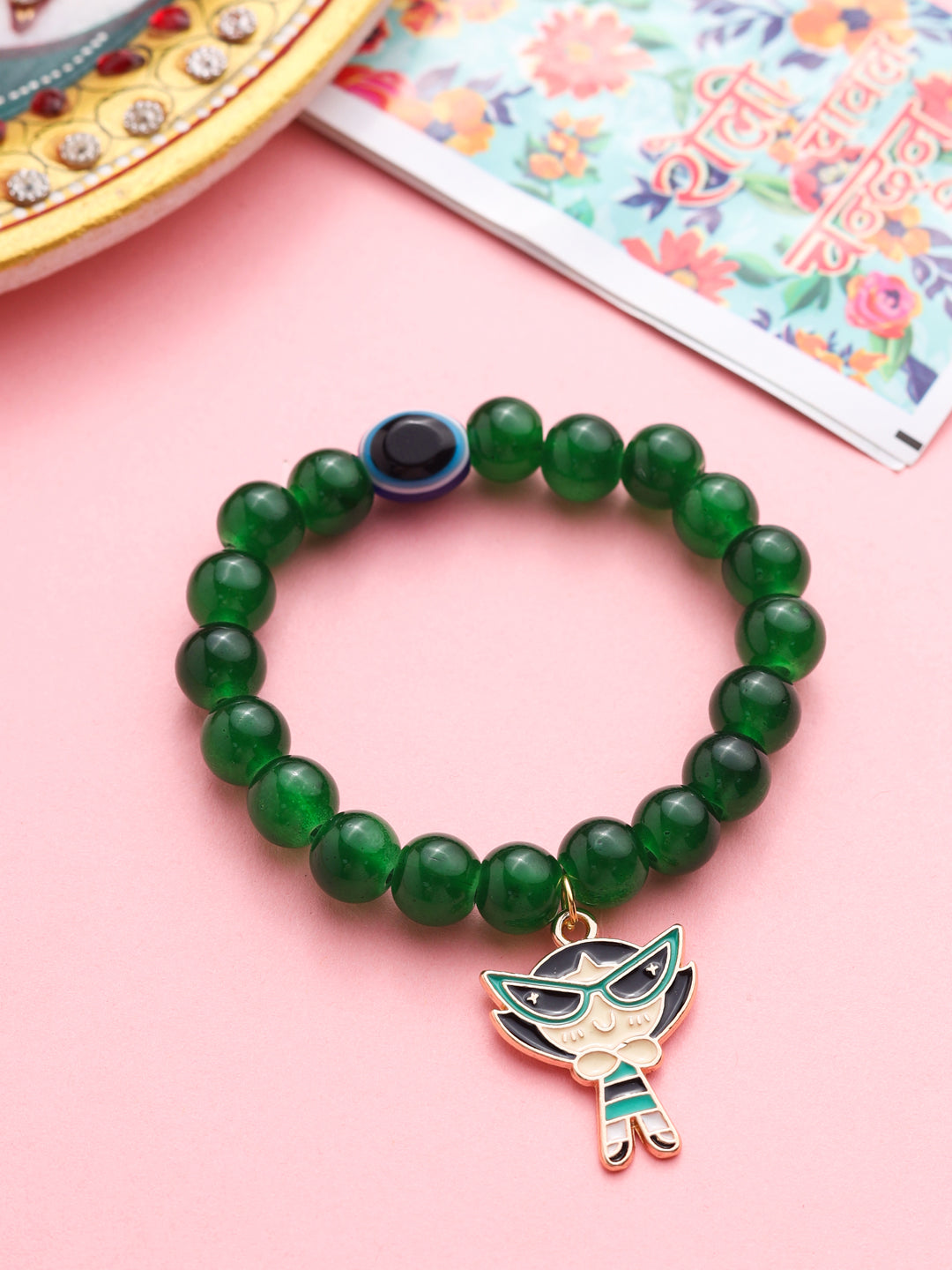 NVR Kids Cartoon Design Green Artificial Beads Thread Rakhi with Roli Chawal Chandan & Mishri - Distacart