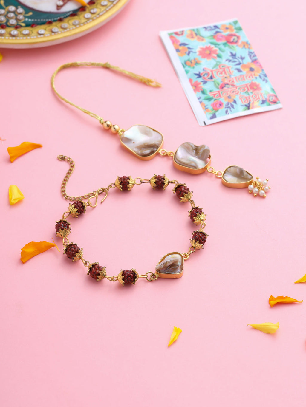 NVR Set of 2 Gold Toned Rudraksh & Pearls Bhaiya Bhabhi Rakhi with Roli Chawal Chandan & Mishri - Distacart