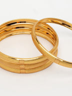 NVR Women's Set of 4 Gold-Polished Traditional Bangles - Distacart