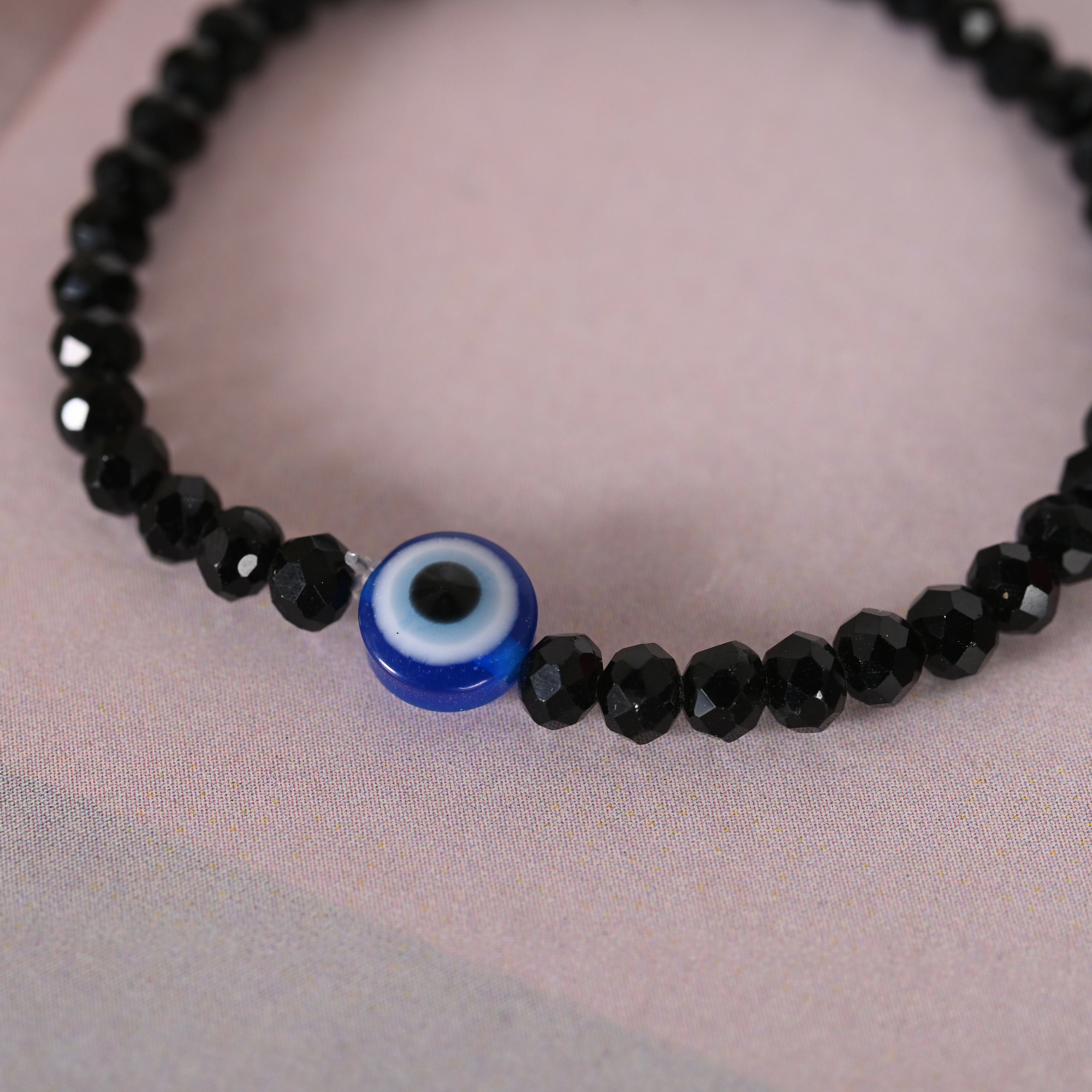 NVR Men & Women Black Evil Eye Crystal Elasticated Bracelet - Distacart