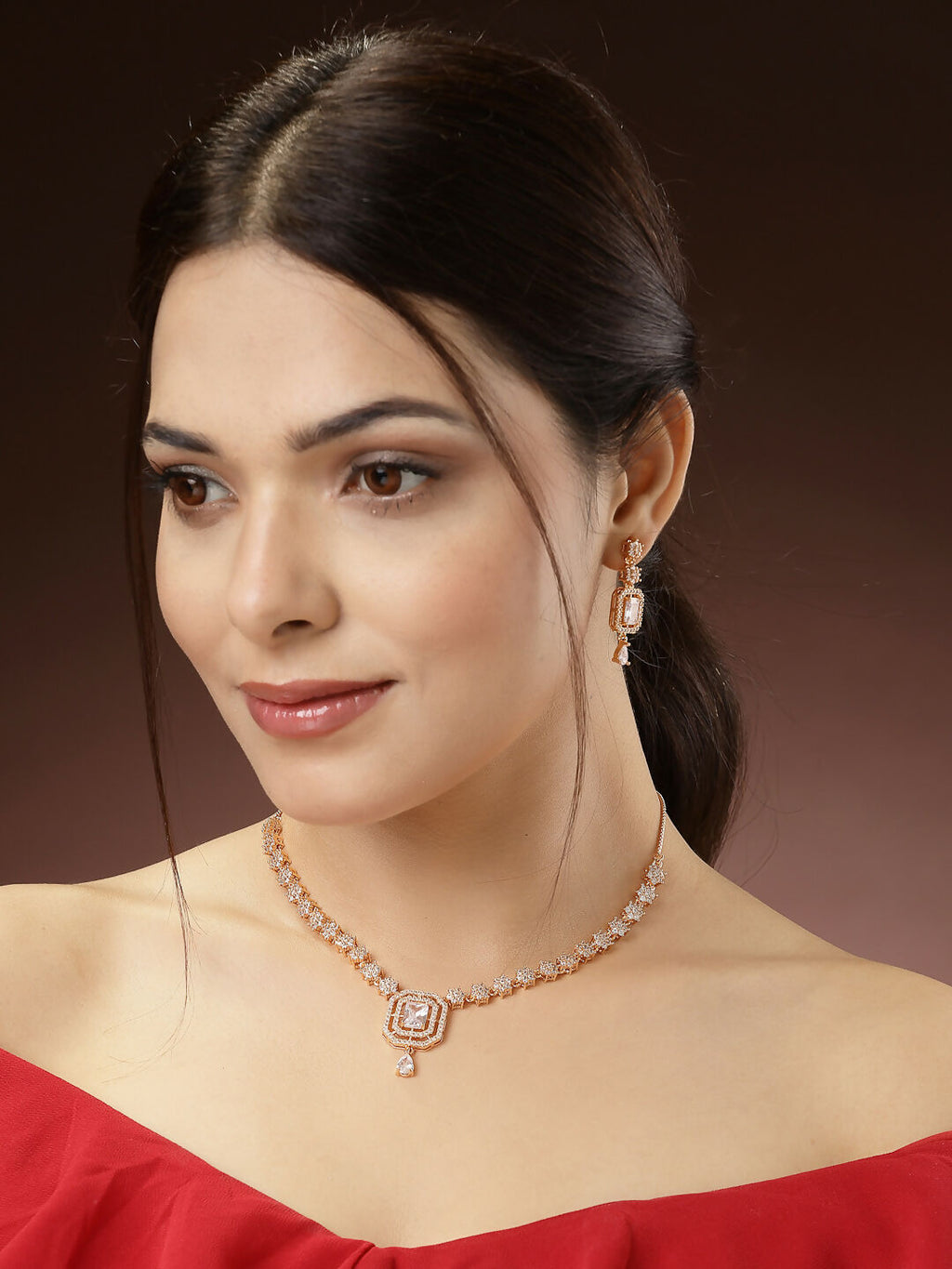 NVR Women's Gold-Polished American Diamond Studded Handcrafted Jewellery Set