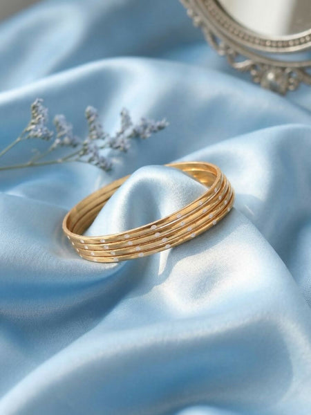 NVR Women Set of 4 Gold Plated Handcrafted CZ Studded Bangle