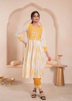 Juniper Mustered and white kurta , solid bottom and tie - dye dupatta with cotton lace , buttons , sequence - Distacart