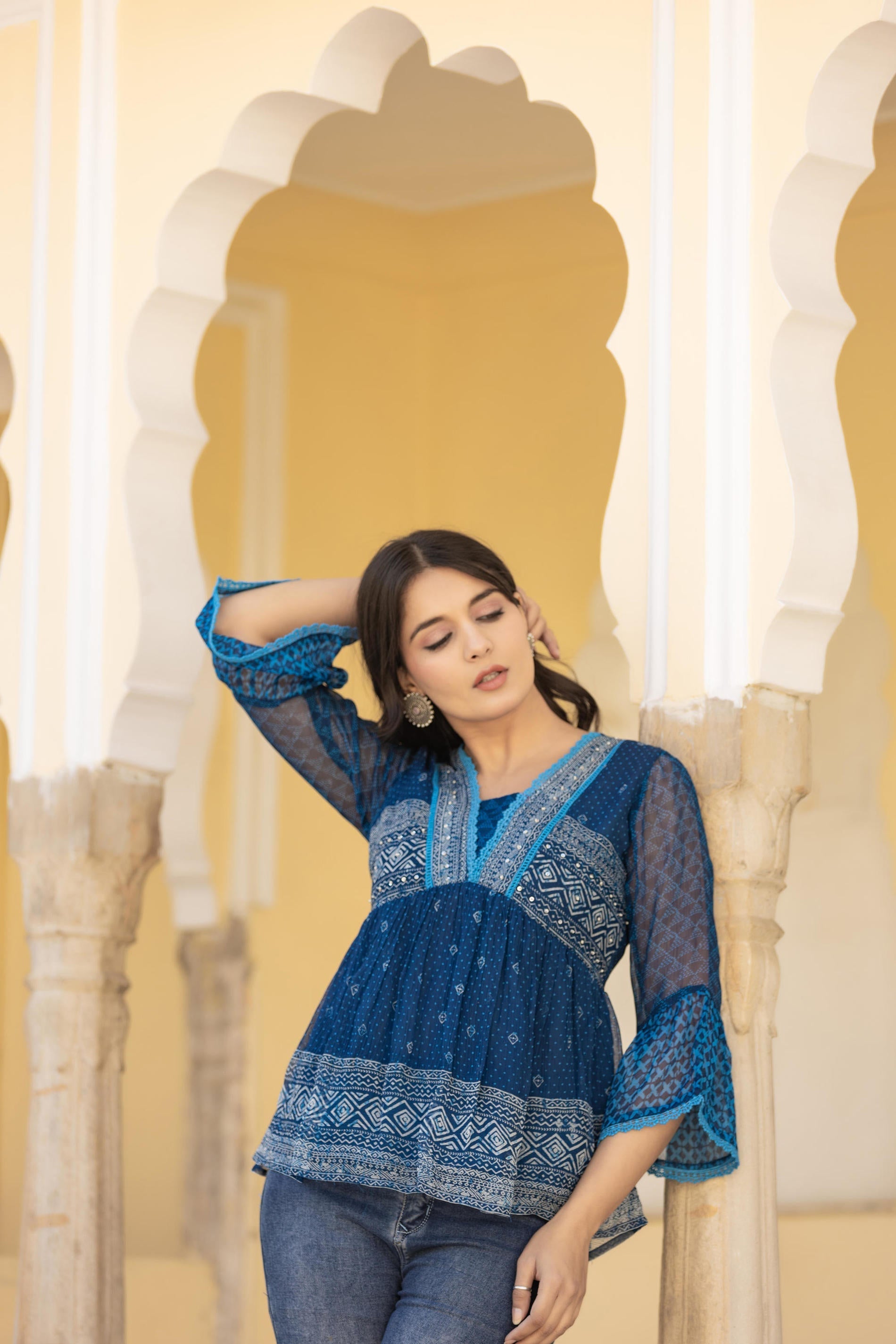 Juniper Indigo Blue Ethnic Motif Peplum Top with Sheer Sleeves