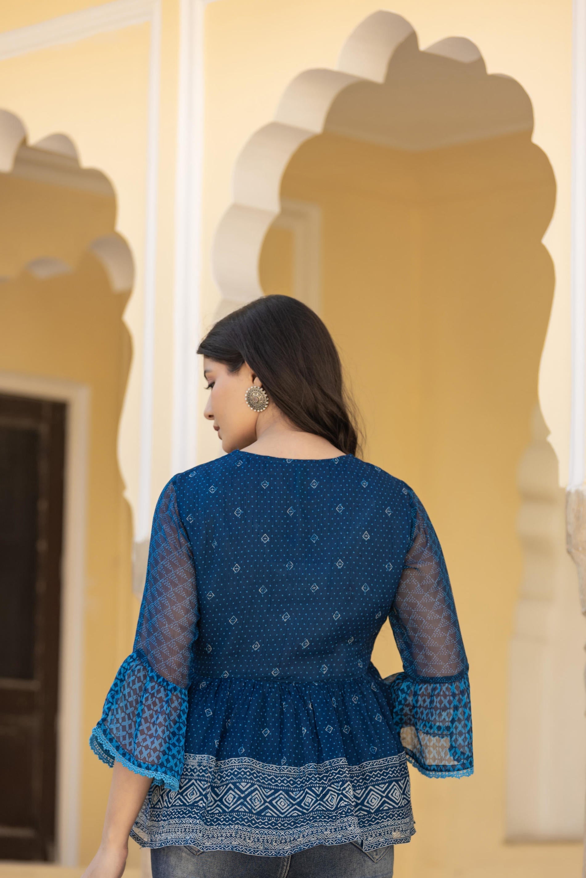 Juniper Indigo Blue Ethnic Motif Peplum Top with Sheer Sleeves