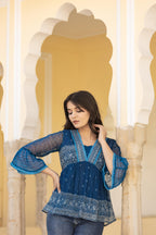 Juniper Indigo Blue Ethnic Motif Peplum Top with Sheer Sleeves