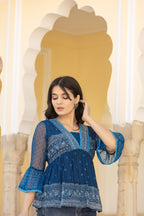 Juniper Indigo Blue Ethnic Motif Peplum Top with Sheer Sleeves
