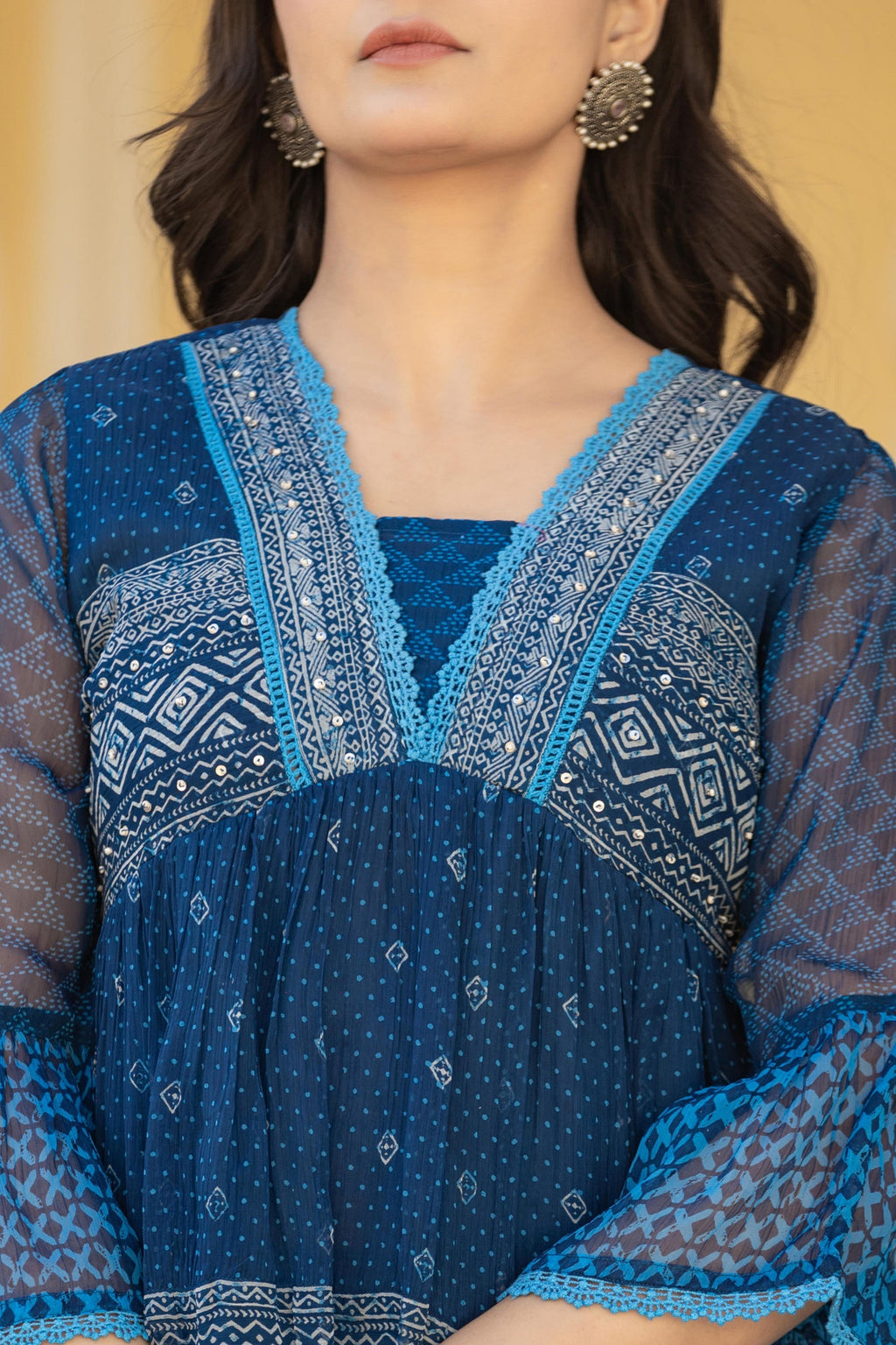 Juniper Indigo Blue Ethnic Motif Peplum Top with Sheer Sleeves