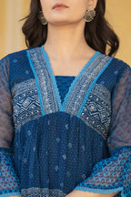 Juniper Indigo Blue Ethnic Motif Peplum Top with Sheer Sleeves
