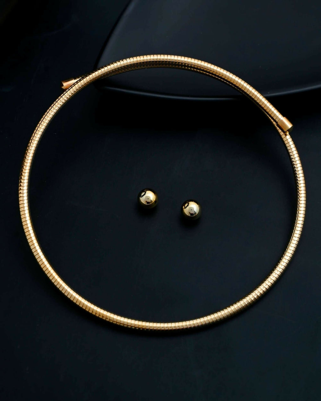 VOJ Gold-Polished Western Snake Hasli with Studs Earrings Set