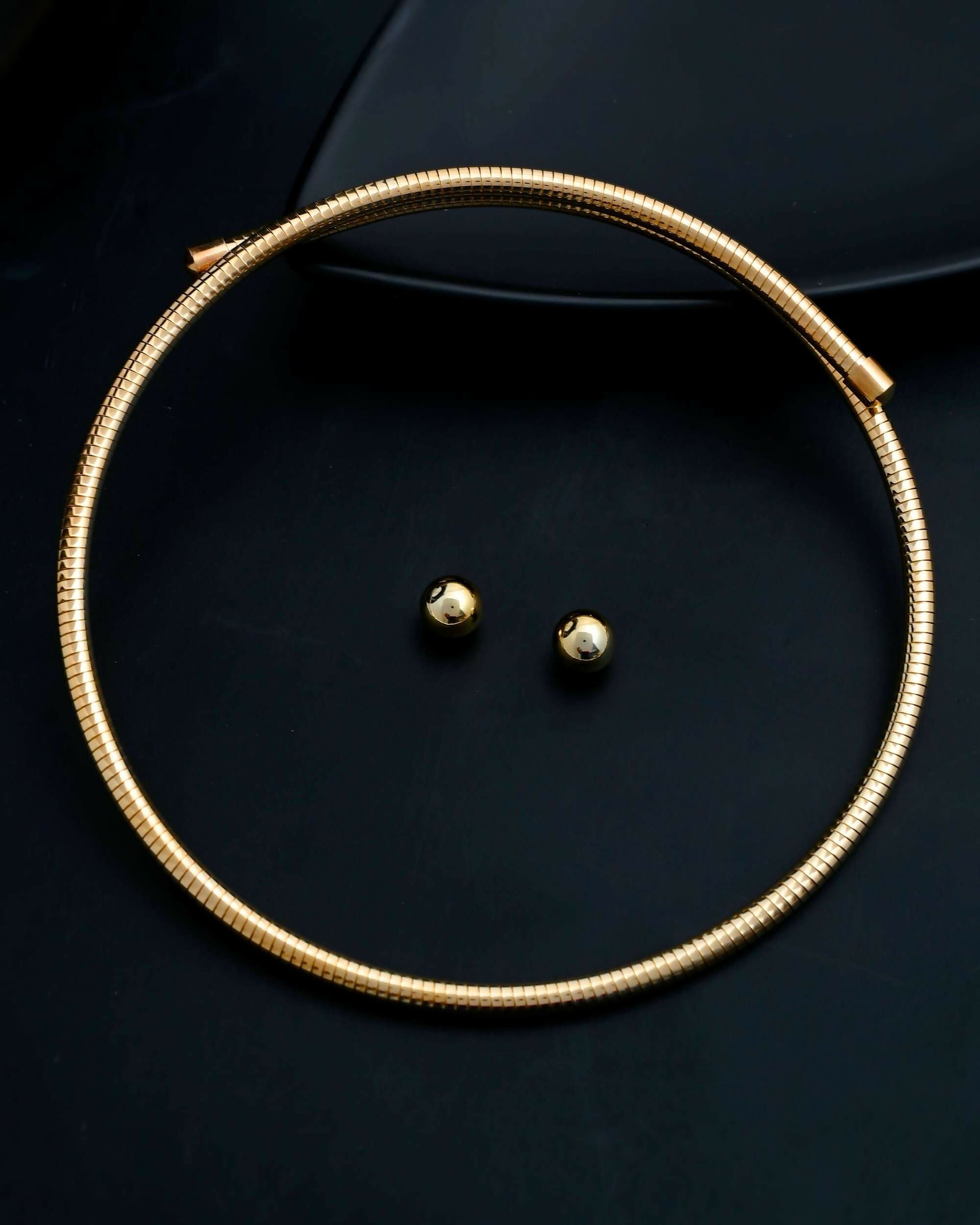 VOJ Gold-Polished Western Snake Hasli with Studs Earrings Set