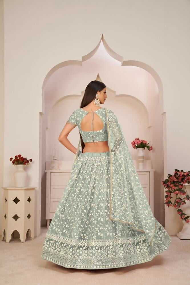 Aastha Fashion Turquoise Green Butterfly Net White Cotton Thread Work, Zari Work And Sandwich Sequence Work Embroidery Wedding Wear Lehenga Choli