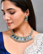 VOJ Silver Plated Oxidized Peacock Print Hasli with Earring Set