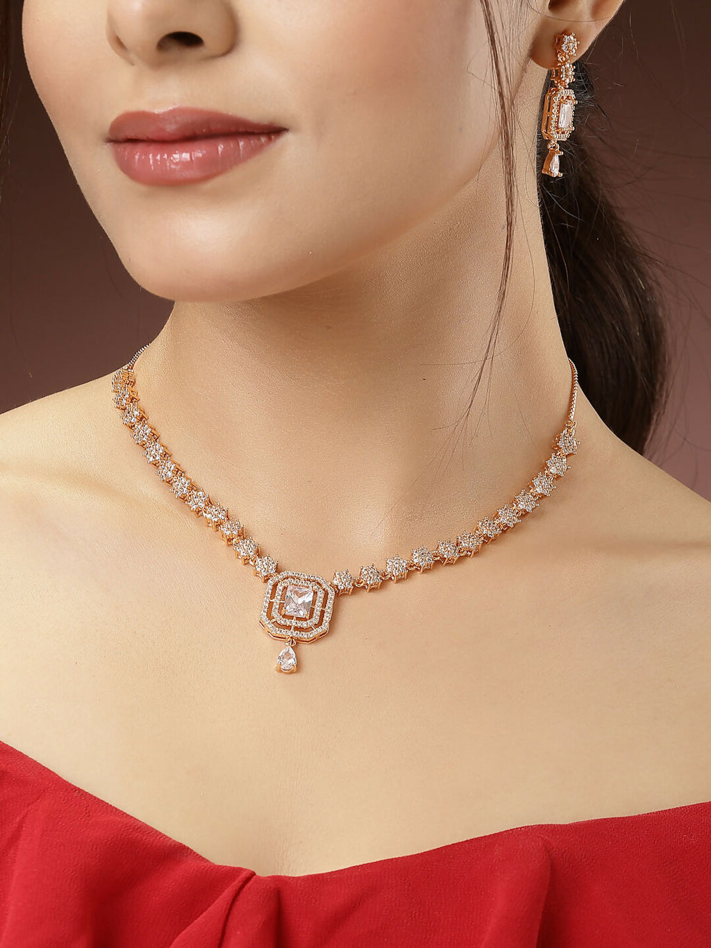 NVR Women's Gold-Polished American Diamond Studded Handcrafted Jewellery Set