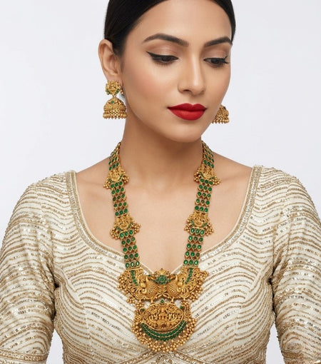 Jewel City Stunning Gold-Plated Temple Jewelry Set with Emeralds | Traditional Haram & Jhumkas | Bridal & Festival Wear