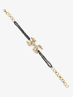 Black Gold-Toned Kundan Bracelet Mangalsutra - Ruby Raang - Distacart