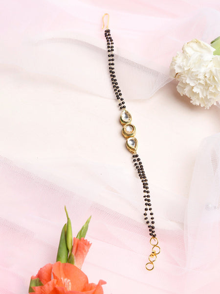 Black Gold-Toned Kundan Bracelet Mangalsutra - Ruby Raang