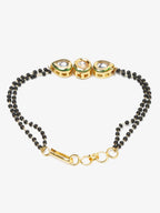 Black Gold-Toned Kundan Bracelet Mangalsutra - Ruby Raang - Distacart