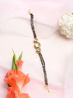 Black Gold-Toned Kundan Mangalsutra Bracelet - Ruby Raang - Distacart