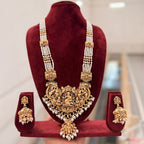 Jewel City Antique Gold-Plated Temple Lakshmi Haram Necklace Set with White Beads & Jhumka Earrings