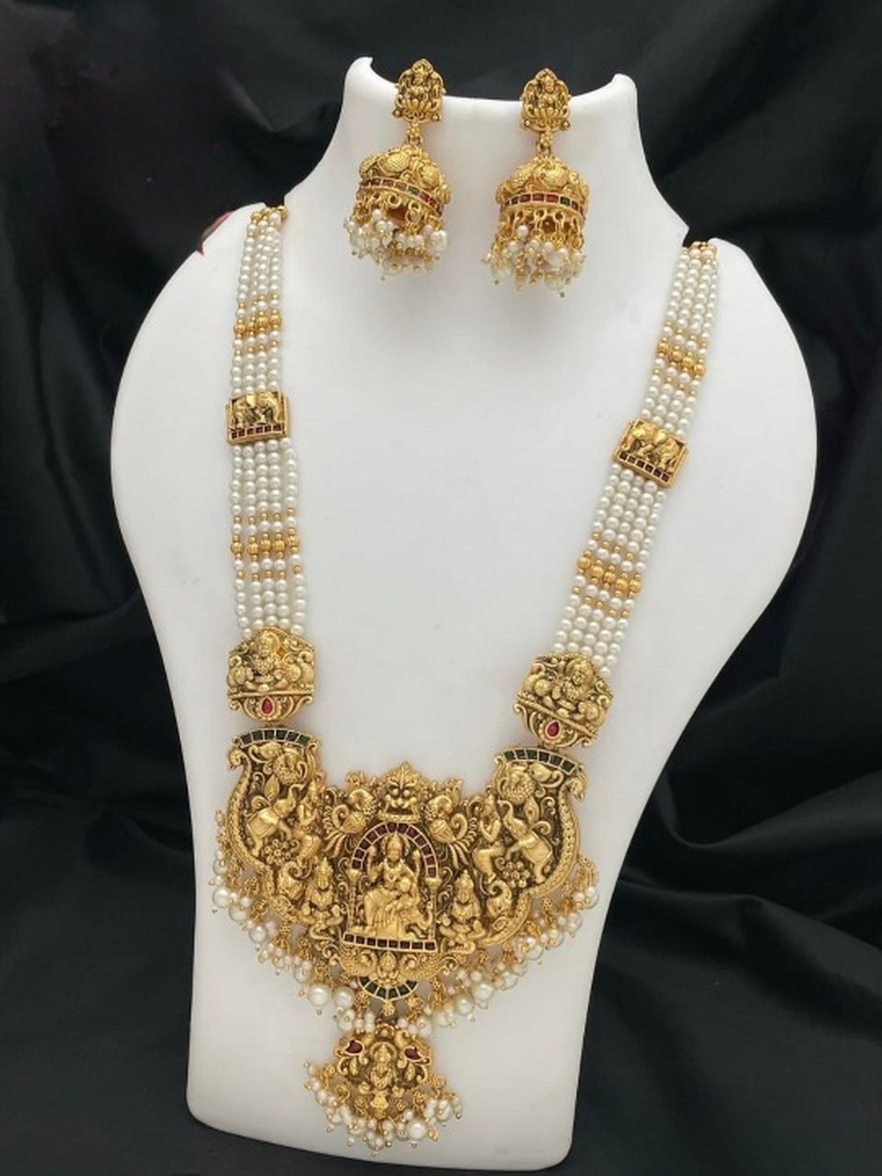 Jewel City Antique Gold-Plated Temple Lakshmi Haram Necklace Set with White Beads & Jhumka Earrings