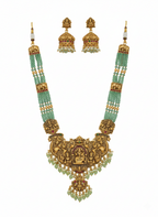 Jewel City Antique Gold-Plated Temple Lakshmi Haram Necklace Set with Green Beads & Jhumka Earrings