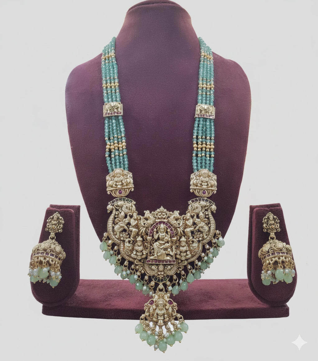 Jewel City Antique Gold-Plated Temple Lakshmi Haram Necklace Set with Green Beads & Jhumka Earrings