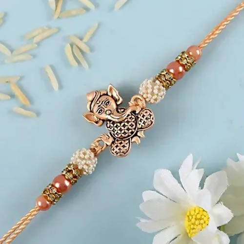 Holy Ganesha Rakhi & 24 Pcs Ferrero Rocher online