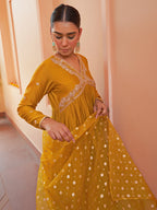 Janasya Women's Mustard Chanderi Emabellished Festive A-line Kurta Set