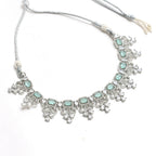 Mominos Fashion Johar Kamal Silver-Plated American Diamond Pista Green Choker Set - Distacart