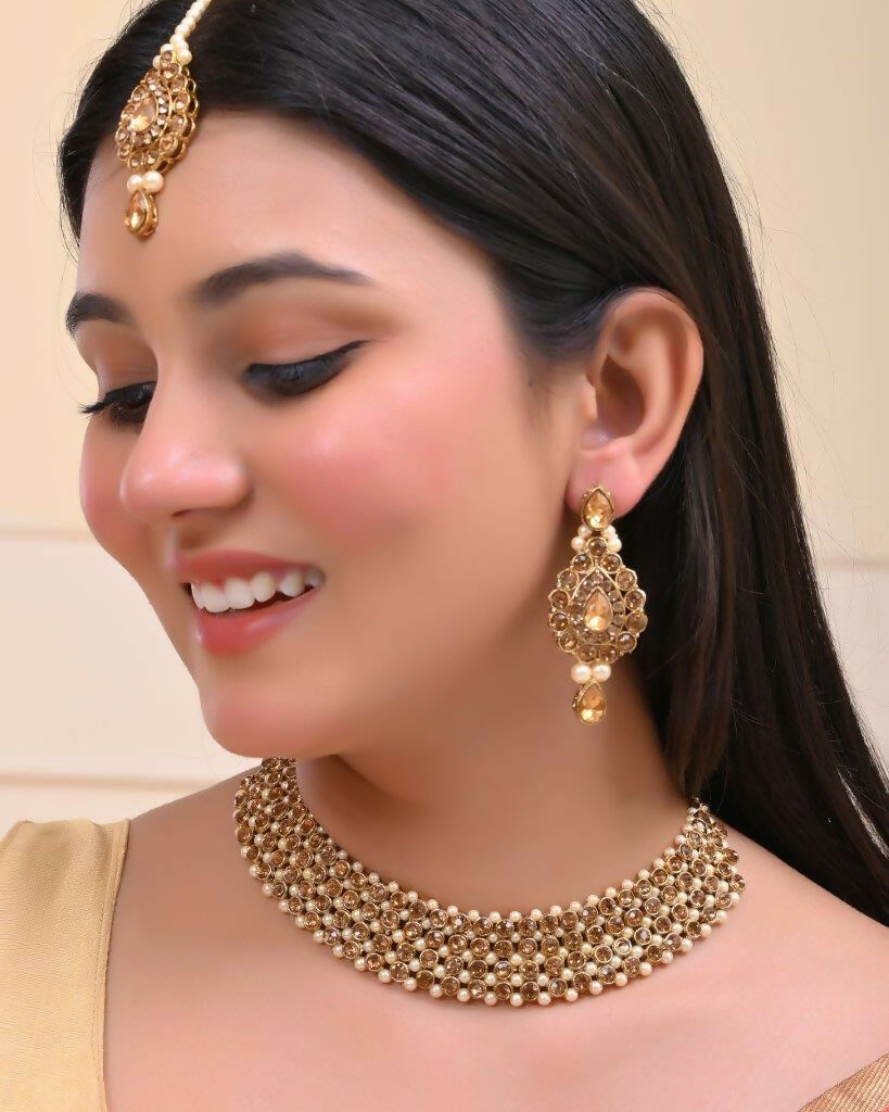 VOJ Gold-Polished Stone Studded Choker Necklace With Earrings And Manag Tikka Set
