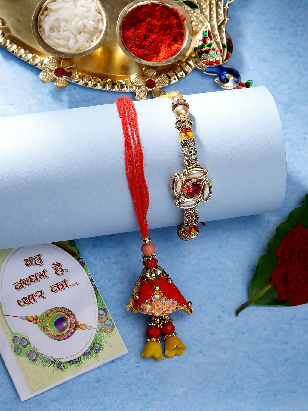 NVR Women & Men Set of 2 Red & Gold-Toned Stone-Studded Bhaiya Bhabhi Rakhi With Roli Chawal & Chocolate - Distacart
