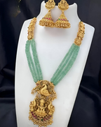 Jewel City Gold-Plated Temple Jewelry Set with Green Beads – Lakshmi & Peacock Design