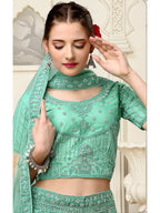 Myra Sea Green Net Heavy Embroidered Lehenga Choli