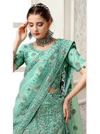 Myra Sea Green Net Heavy Embroidered Lehenga Choli