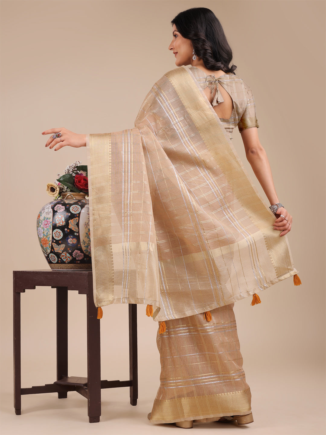 Shree Shyam Fashion Cream Organza Woven Zari Work Traditional Tassel Saree
