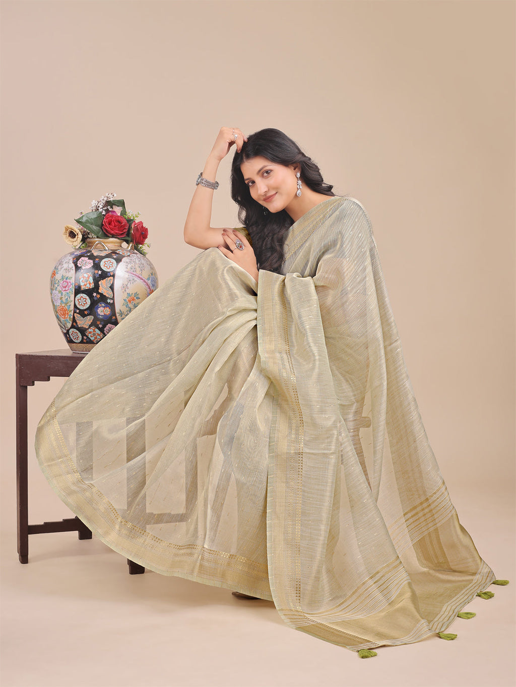 Shree Shyam Fashion Cream Organza Woven Zari Work Traditional Tassel Saree