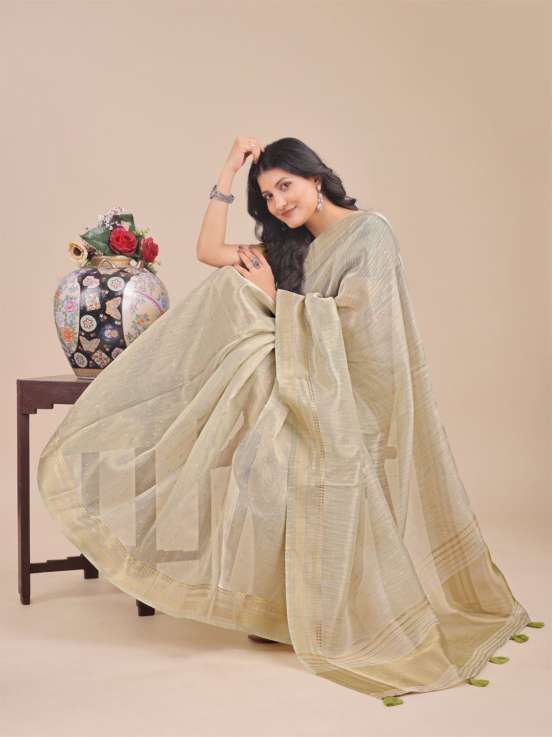 Shree Shyam Fashion Cream Organza Woven Zari Work Traditional Tassel Saree