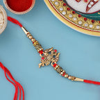 trueBrowns X Voylla Designer Ganesha Rakhi With Roli Chaawal Pack - Distacart