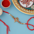 trueBrowns X Voylla Designer Ganesha Rakhi With Roli Chaawal Pack - Distacart